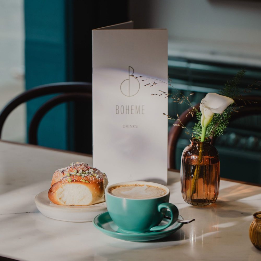 Boheme restaurant menu with a coffee and a bun.