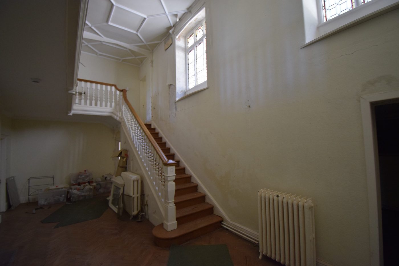 Craig y Don pre renovation staircase hall